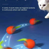 A series of orange and green motion toys are arranged in a circular path on a blue surface.