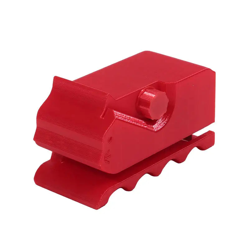 Red handheld cardboard strip cutter tool for DIY projects and crafts