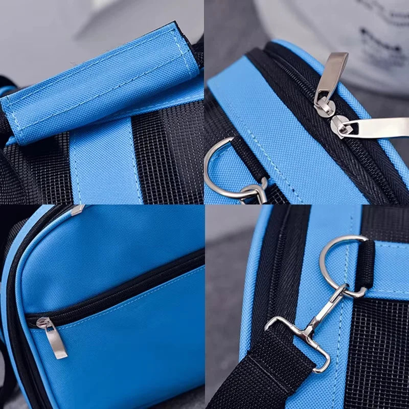 Close-up view of a blue and black mesh travel carrier bag with silver hardware.