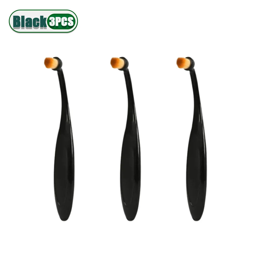 Three black pet tear stain remover brushes with orange tips for dogs and cats