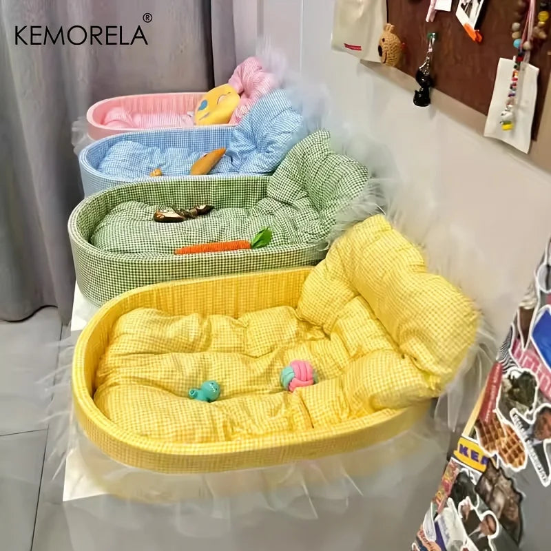 A stack of colorful pet beds and mats, including yellow, blue, and green options, displayed on a surface.