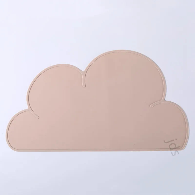 A beige cloud-shaped silicone pet feeding mat.
