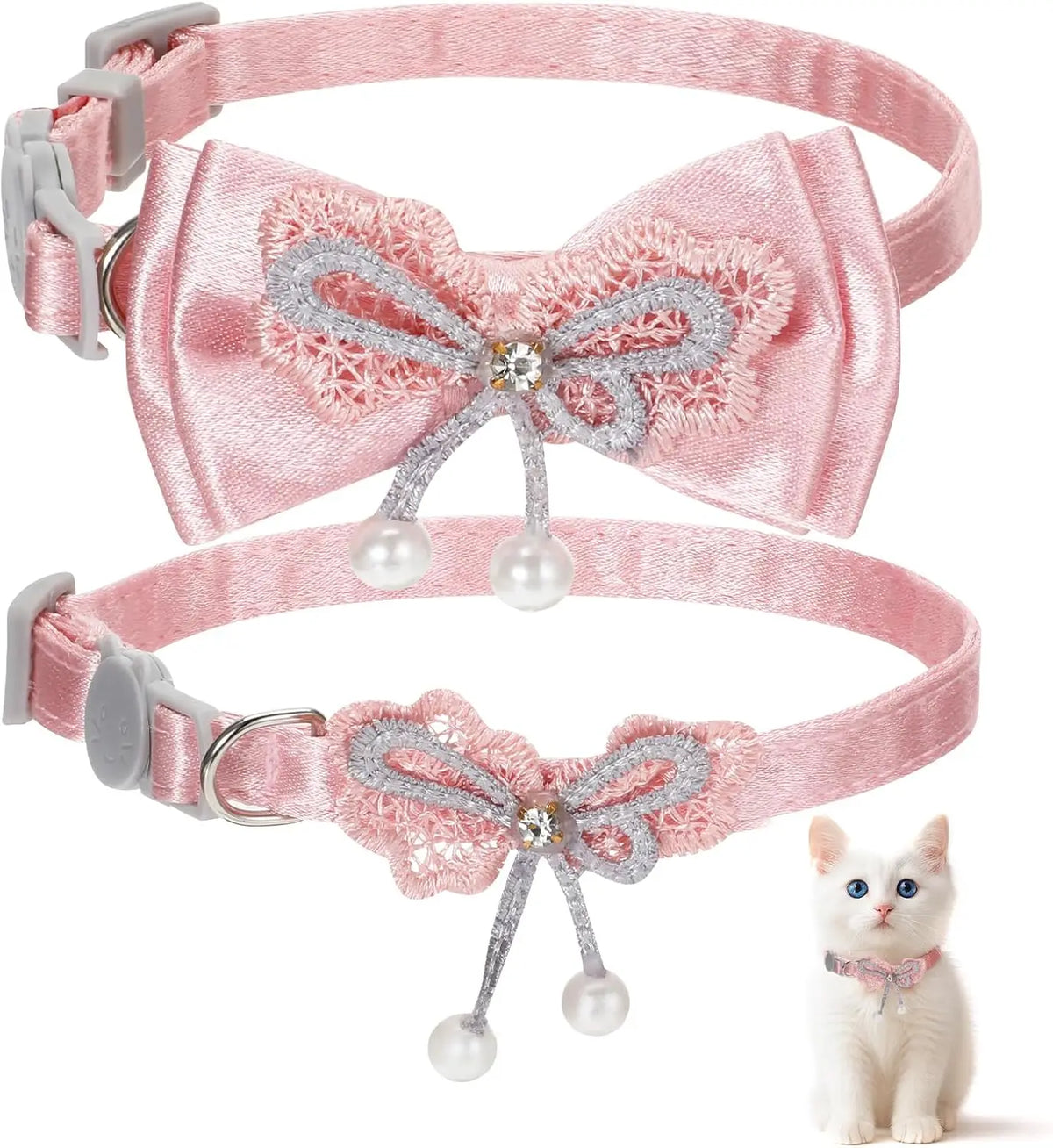 A pink satin cat collar with a decorative bow and safety buckle shown against a white background.