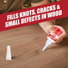 A hand applies All-Purpose Cyanoacrylate Adhesive Super Glue to fill knots, cracks, and small defects in wood.