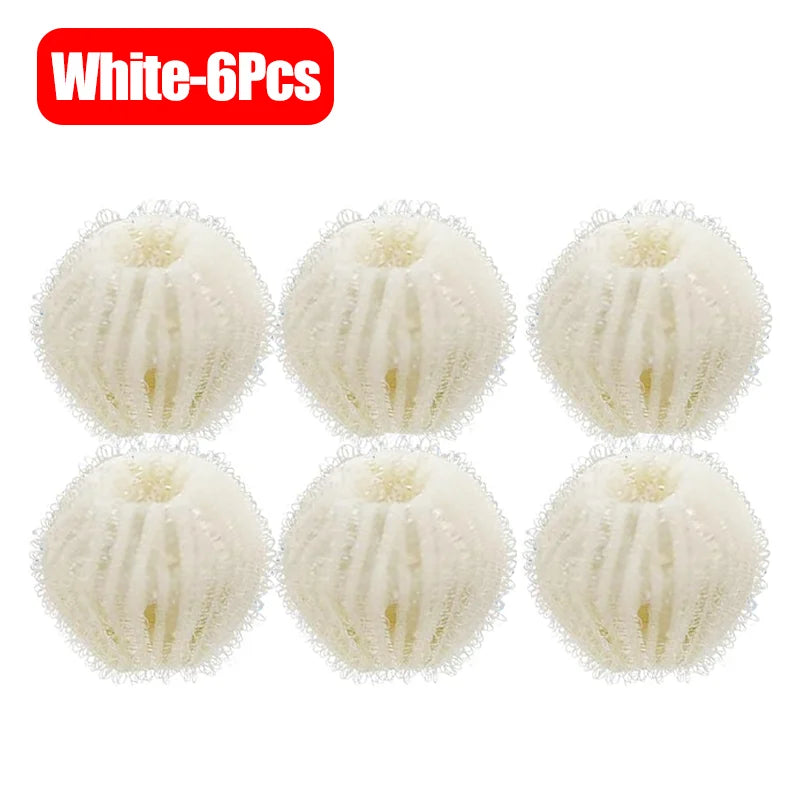 Six white reusable lint filter balls used for laundry
