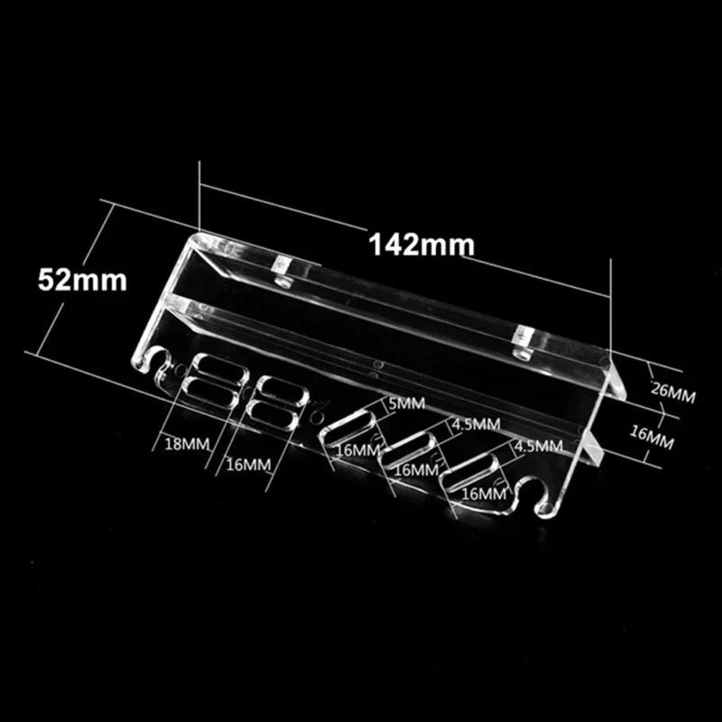 A transparent acrylic tool organizer with various sized slots and openings, shown from above.