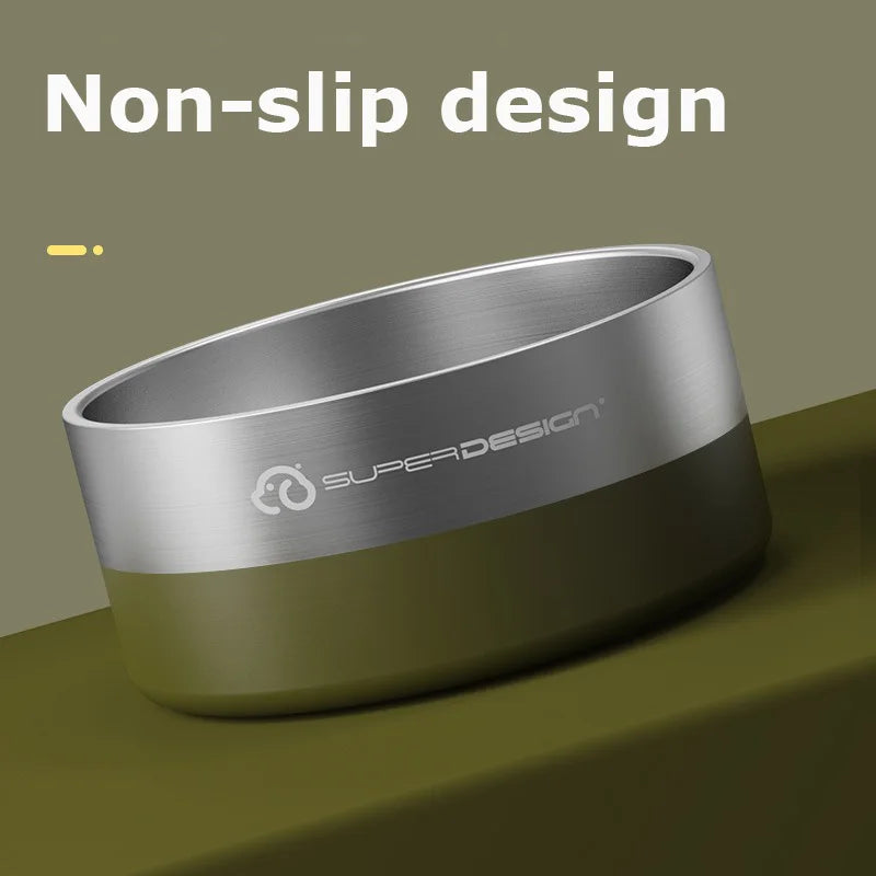A stainless steel insulated dog bowl with a non-slip design shown in a muted olive green color.