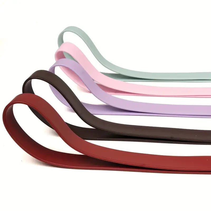 A set of five colored waterproof PVC dog leashes in shades of green, pink, purple, and brown.