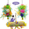 Three colorful parrot shredder toys made of natural wood and fibers hanging by strings.