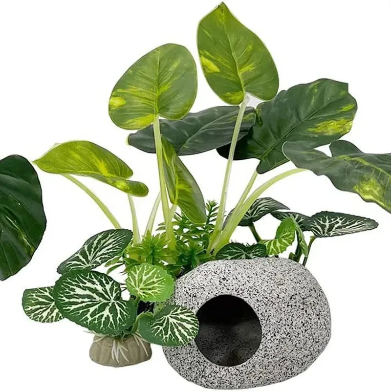 A set of realistic plastic plants with secure bases for aquarium landscaping.