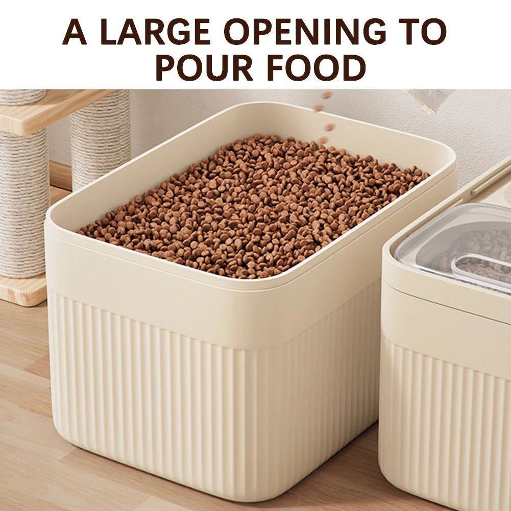 A large, light beige airtight pet food storage container with a large opening is shown filled with dry kibble.