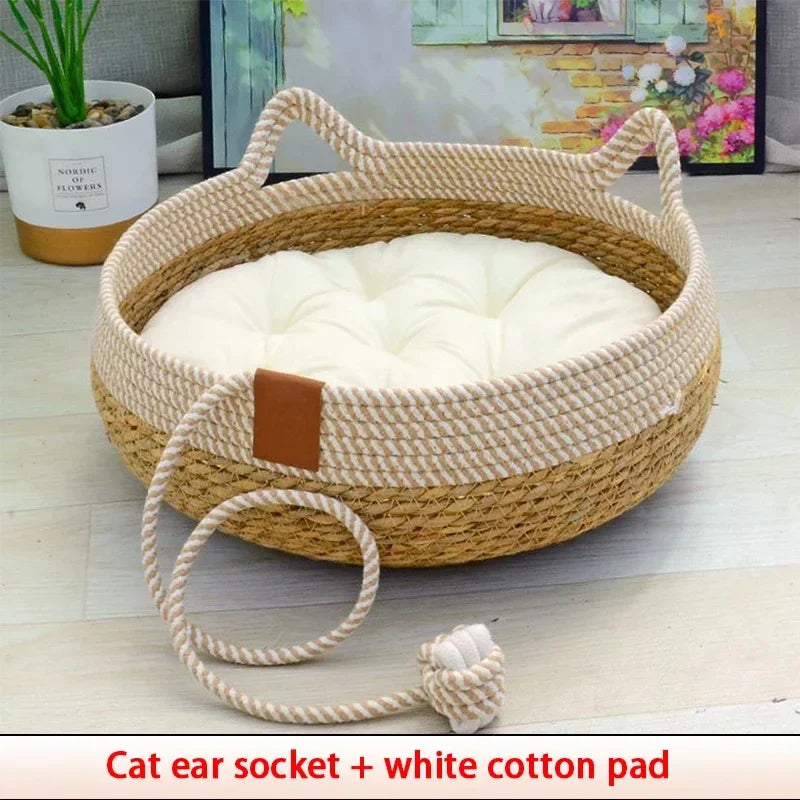 Woven rattan cat bed with a white cotton pad and a leather ear socket