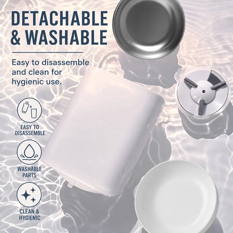 A white detachable and washable pet feeder with stainless steel bowls shown in a close-up against a light background.