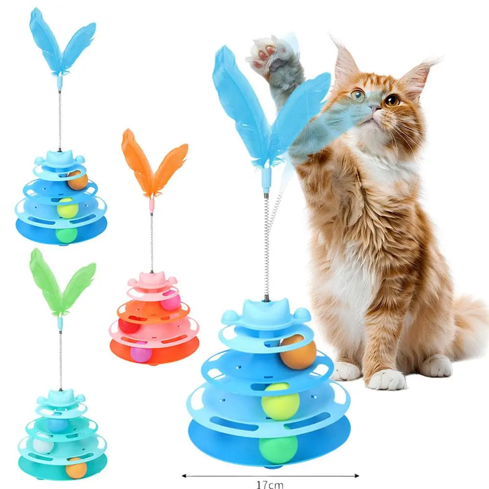 A fluffy orange cat is interacting with a blue and yellow rotating feather toy tower.