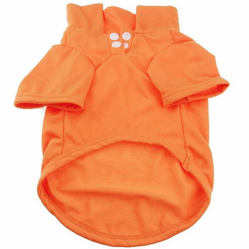 An orange classic polo shirt for a small dog, featuring a collar and buttons.