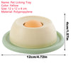 A yellow polypropylene pet licking tray with a round orange object, shown from above.