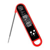 A red instant read digital meat thermometer with a backlit display and probe.