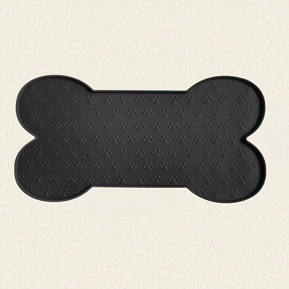 Black non-slip silicone dog feeding mat with raised edges.