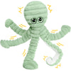 Weiches, hellgrünes Plüschtier in Form eines Oktopus mit mahlenden Zähnen.