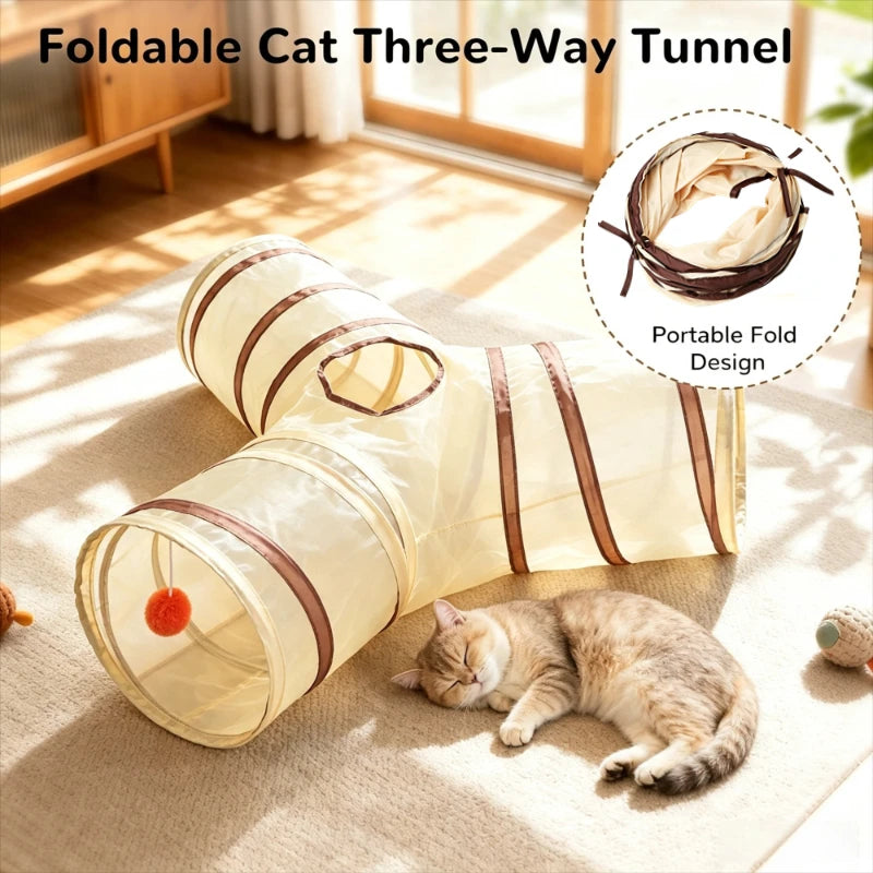 A light yellow foldable cat three-way tunnel is shown on a rug with a sleeping tabby kitten.