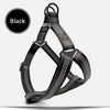 Black breathable reflective dog harness with leash shown against a white background.