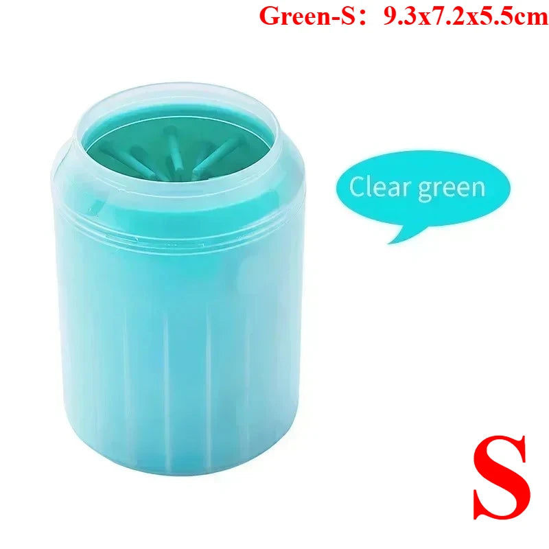 A clear green portable paw washer cup with soft silicone bristles.