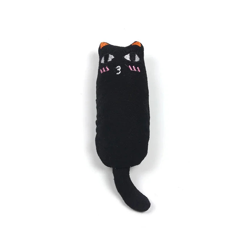 A black plush cat toy shaped like a thumb pillow with pink eyes and whiskers.