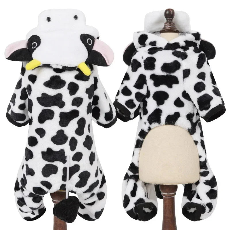 A white and black cow cartoon animal pet costume jumpsuit displayed on a mannequin.