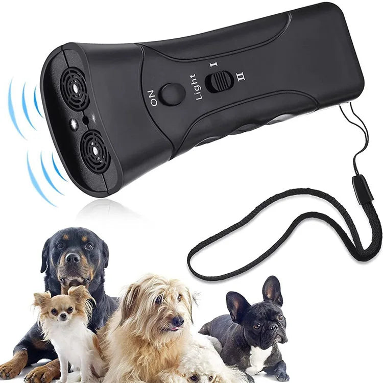 A black ultrasonic dog training device is shown with a cord, alongside several dogs.