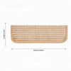 A rectangular jute scratching pad for cats with a light tan color and visible stitching.