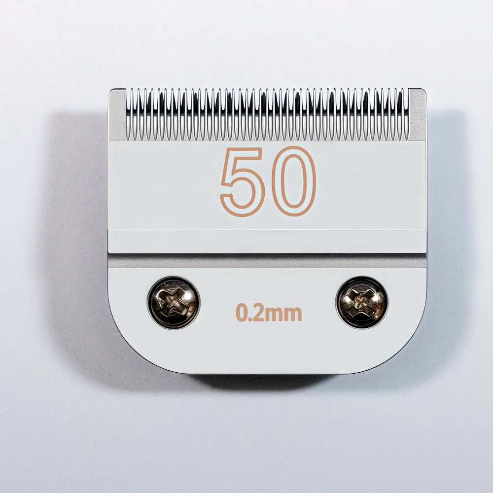 A close-up of a silver pet clipper blade with the number 50 and a 0.2mm measurement visible.