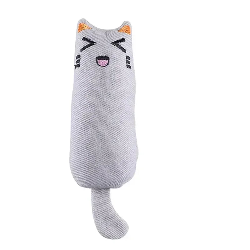 A gray cat-shaped chew pillow toy with orange ears and a pink mouth, designed for stress relief.