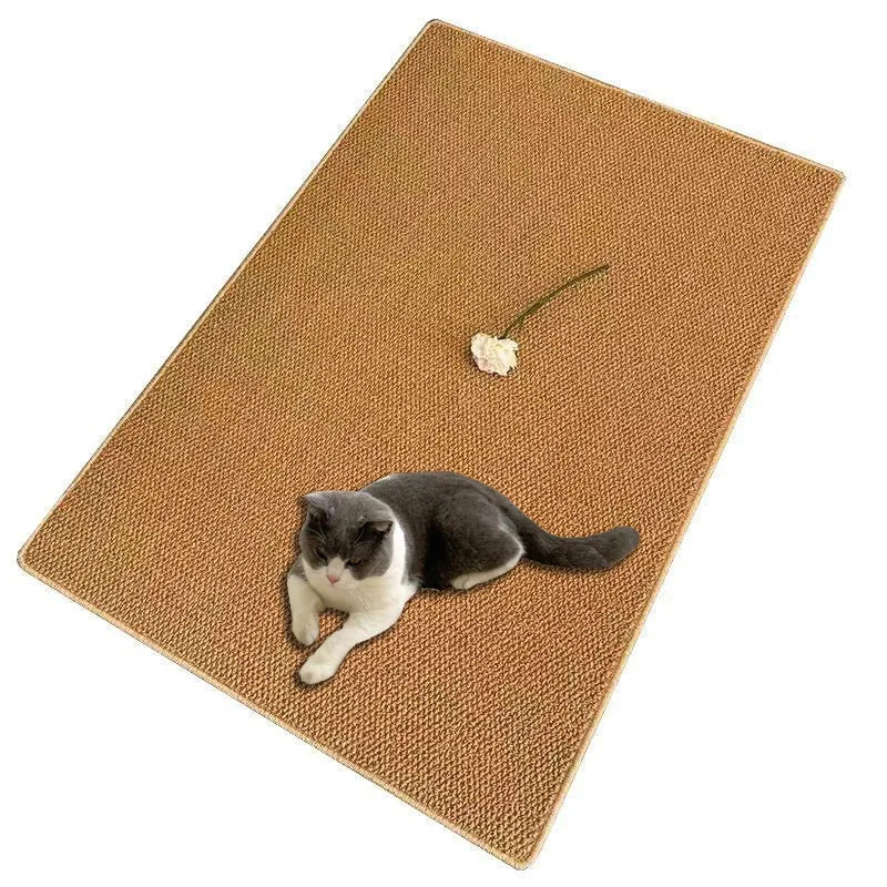 A natural sisal cat scratching mat with a non-slip base featuring a gray and white cat.