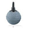 A gray aquarium air stone with a black nozzle and a measurement line indicating the diameter.