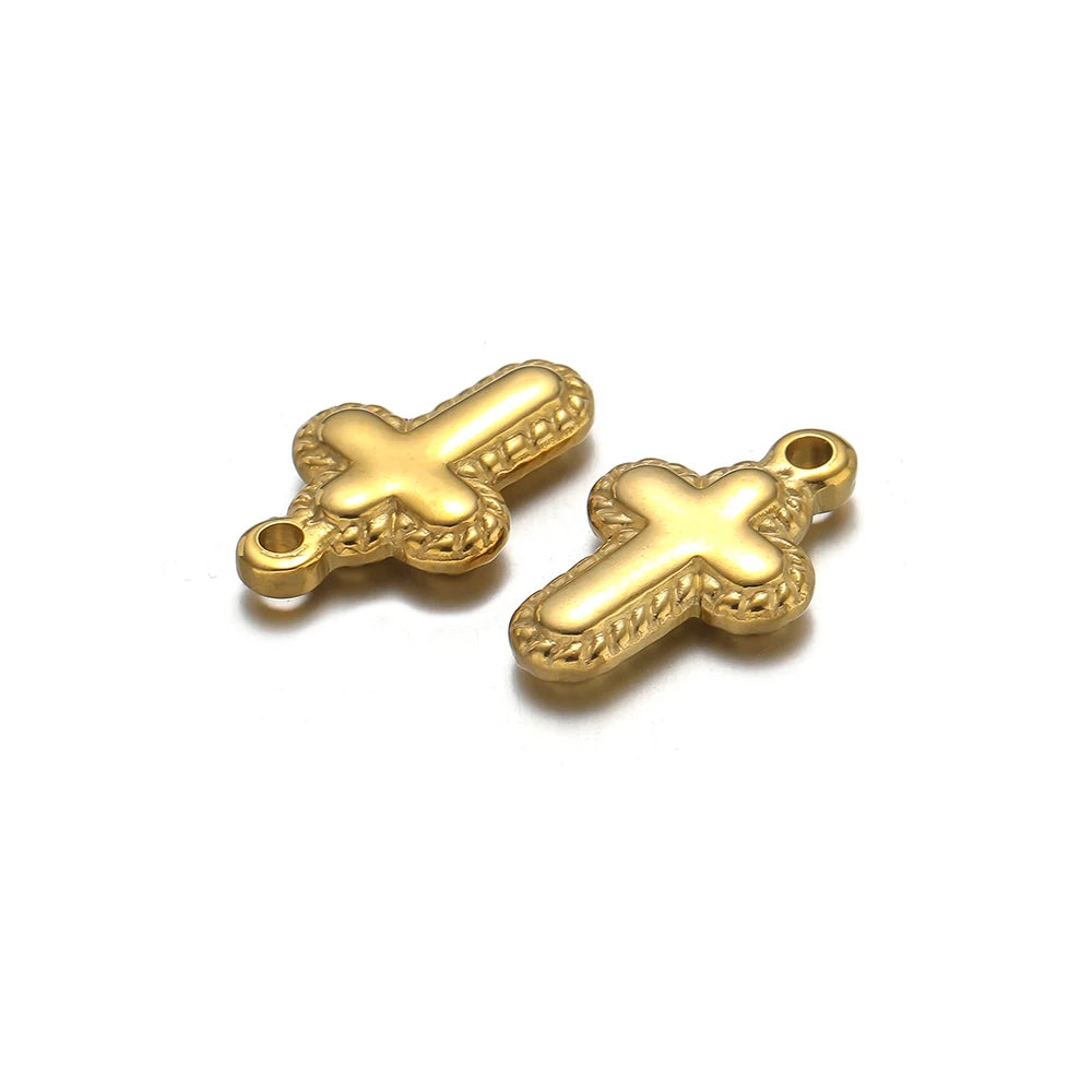 A pair of vintage gold-colored cross charms for DIY jewelry making