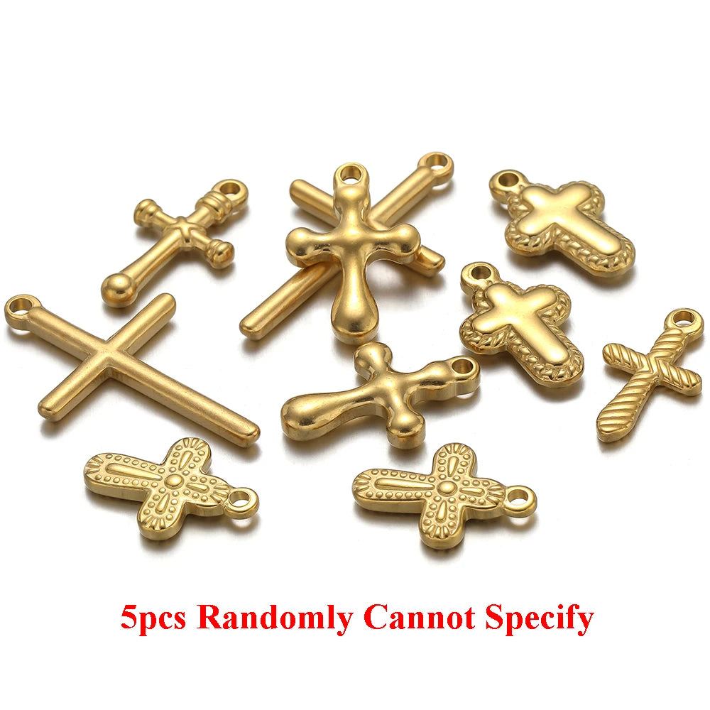 A set of five gold-colored cross charms for DIY jewelry making