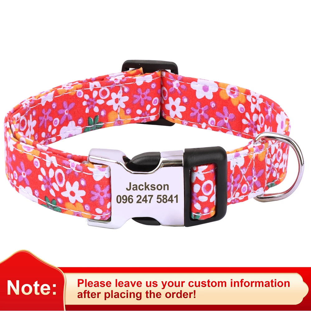 Red floral print dog collar with a silver buckle and an engraved name tag.