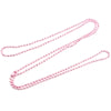 A set of gold and silver plated ball necklaces laid out on a white background.