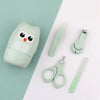 A light green portable nail care set featuring a cute owl design and various tools on a white background.