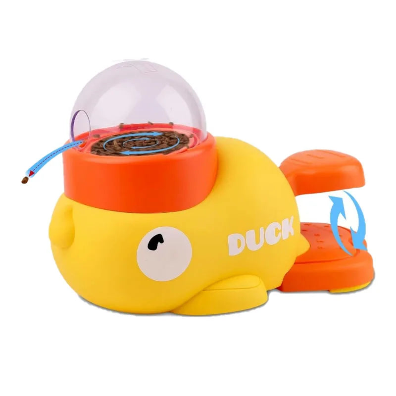Distributeur de friandises pour chien en forme de canard jaune avec un couvercle orange et une coupole transparente.