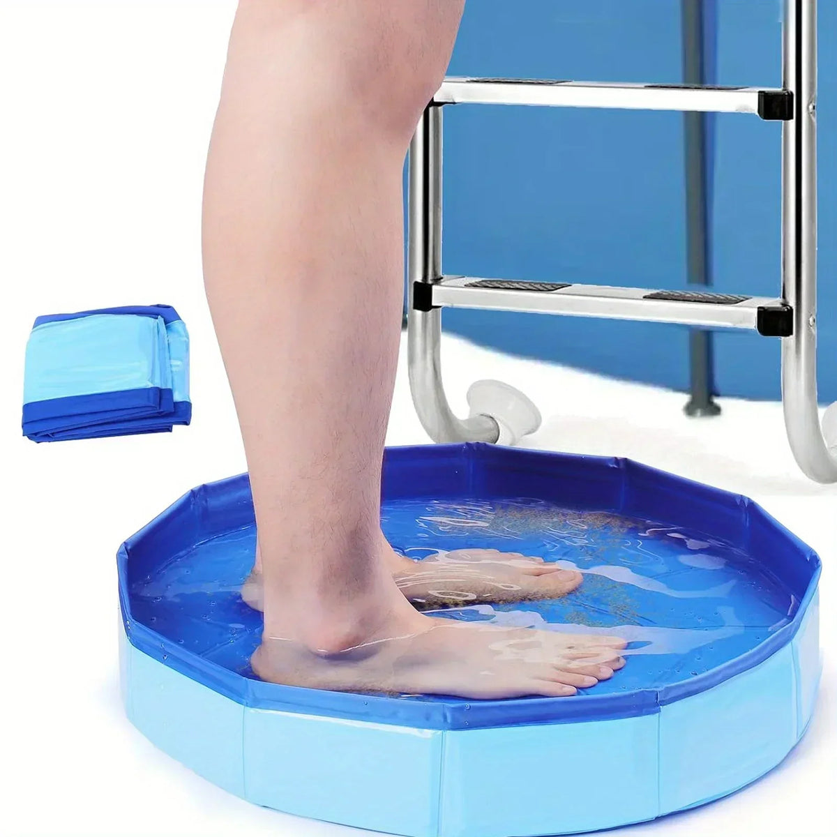 A person's leg is shown dipping a foldable pet swimming pool into water.