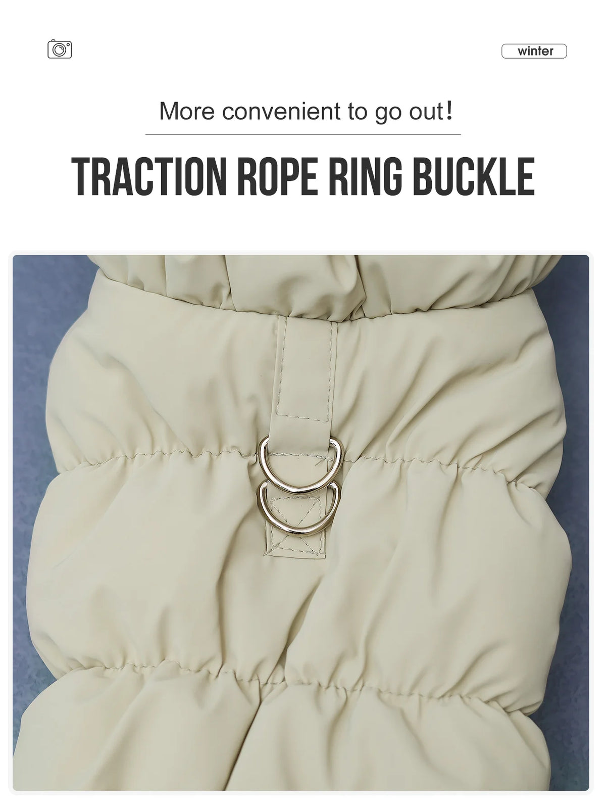 Close-up of a beige quilted dog jacket showing a brass traction rope ring buckle closure.