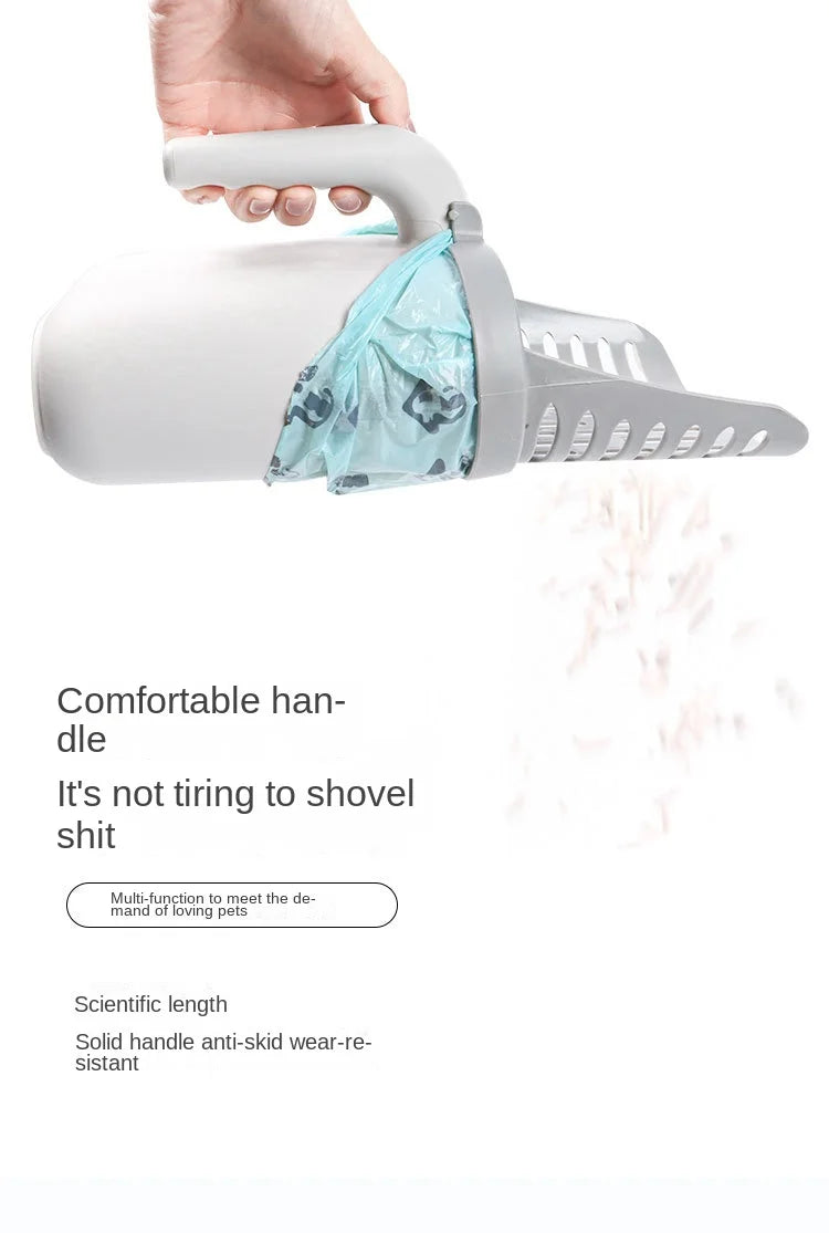 A hand is holding a white cat litter scoop with a handle and a clear plastic bag filled with litter.