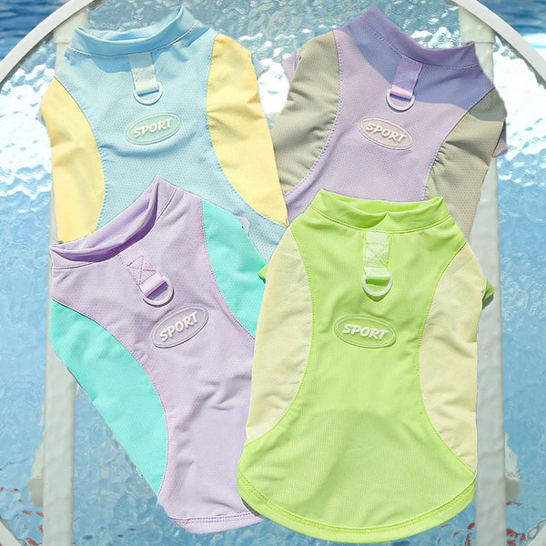 A collection of purple, yellow, and lime green breathable cooling dog vests for sun protection.