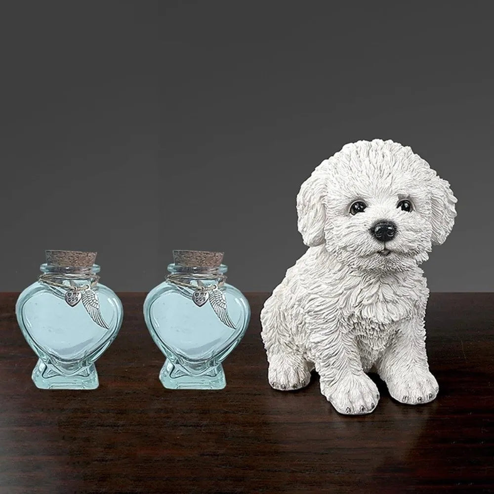 A white, fluffy dog figurine sits next to two glass perfume bottles with silver feather accents.