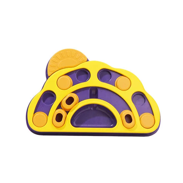 Jouet distributeur interactif pour chien et chat jaune avec des compartiments de nourriture violets et oranges.