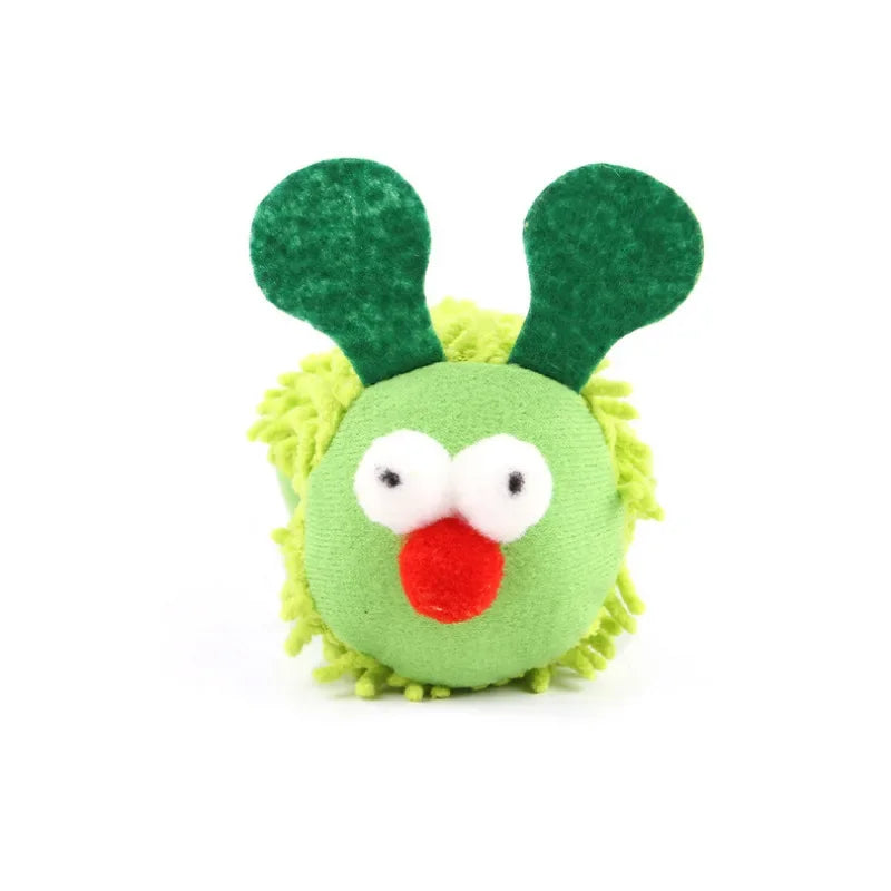A green cat chew toy with green ears and a red nose, made of felt.
