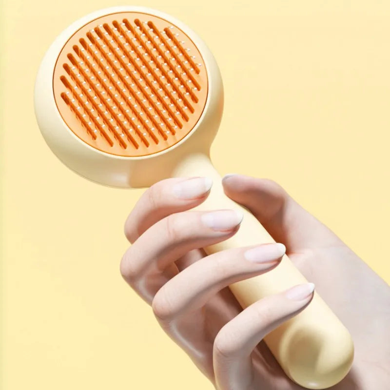 Brosse auto-nettoyante pour chats avec retrait des poils en un clic