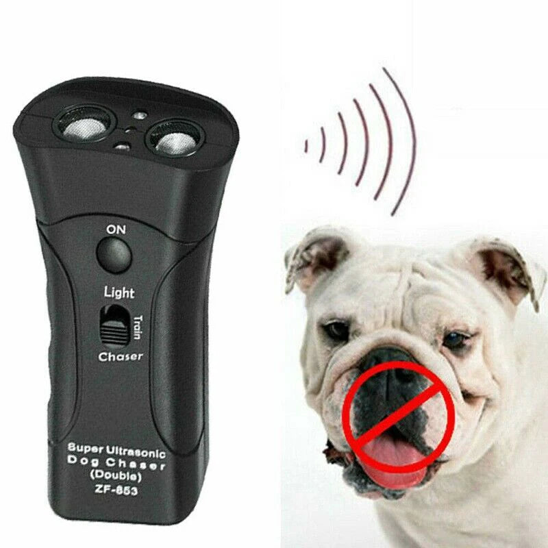 A black ultrasonic dog chaser device is shown next to a dog with its mouth open.