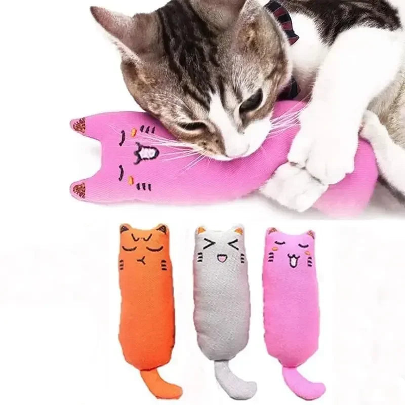 Three cat-shaped silicone chew toys in orange gray and pink for kittens